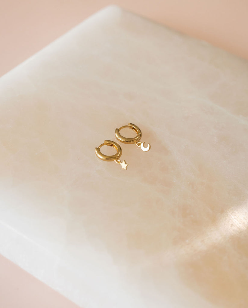 Star and Moon Huggie Hoop Earrings in Gold